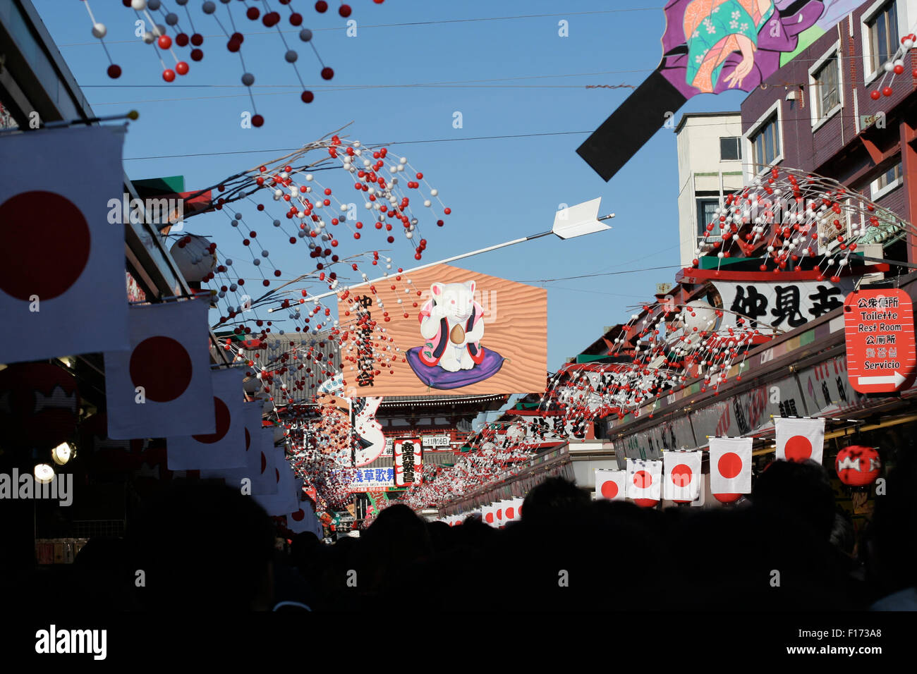 Asakusa Sensoji New Years decorations top of peoples heads silhouetted Stock Photo