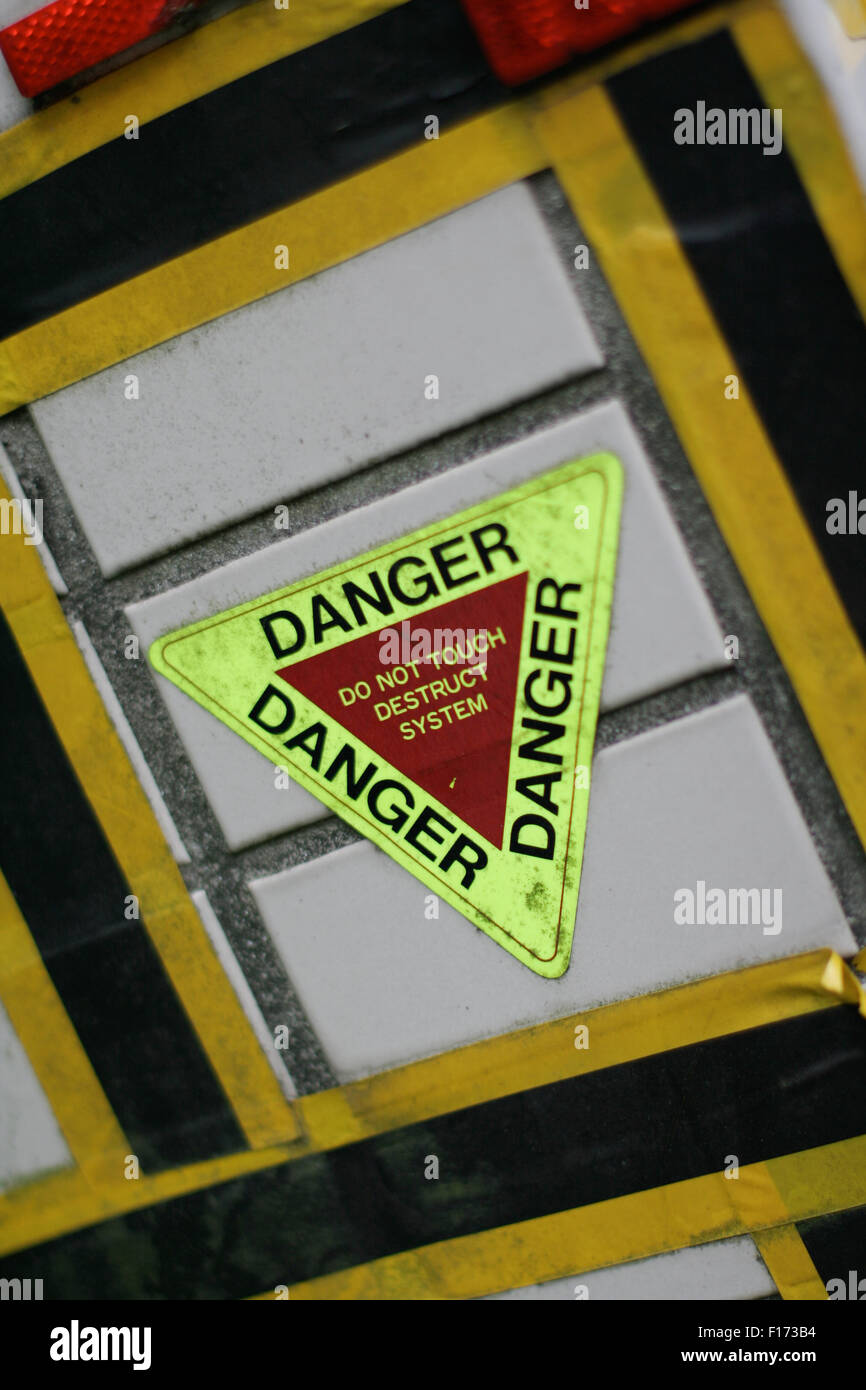 Danger sticker sign neon yellow and red Stock Photo