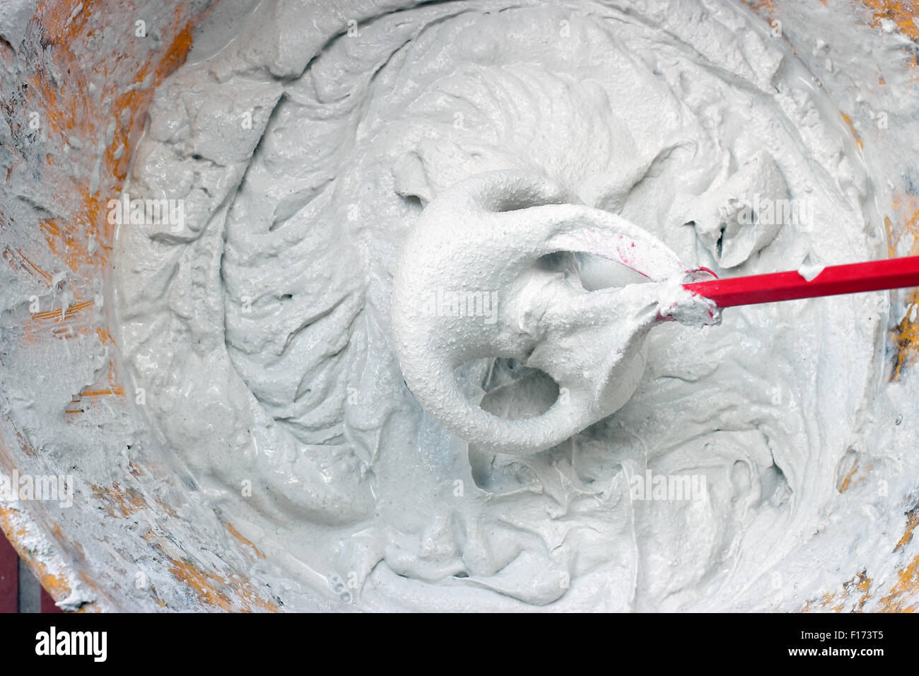 mixing Tile adhesive or cement with a power drill Stock Photo Alamy