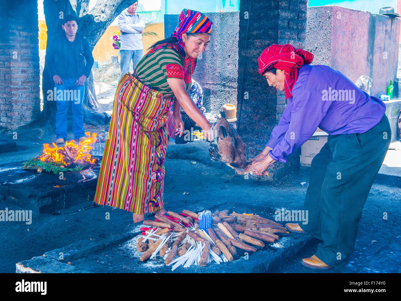 Guatemalan people take part in a traditional Mayan ceremony in Chichicastenango , Guatemala Stock Photo