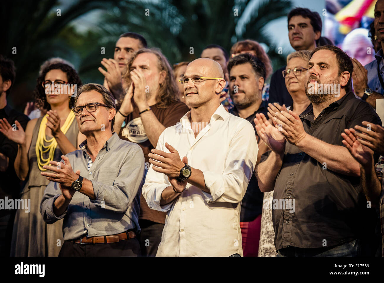 Barcelona, Catalonia, Spain. 28th Aug, 2015. Catalan president Artur Mas (L), Raul Romeva (C) and ORIOL JUNQUERAS (R) number 4, 1 and 5 of the pro-independence cross-party electoral list 'Junts pel Si' (Together for the yes) during their 'Festival of the Candidates' in Barcelona. Credit:  Matthias Oesterle/ZUMA Wire/Alamy Live News Stock Photo