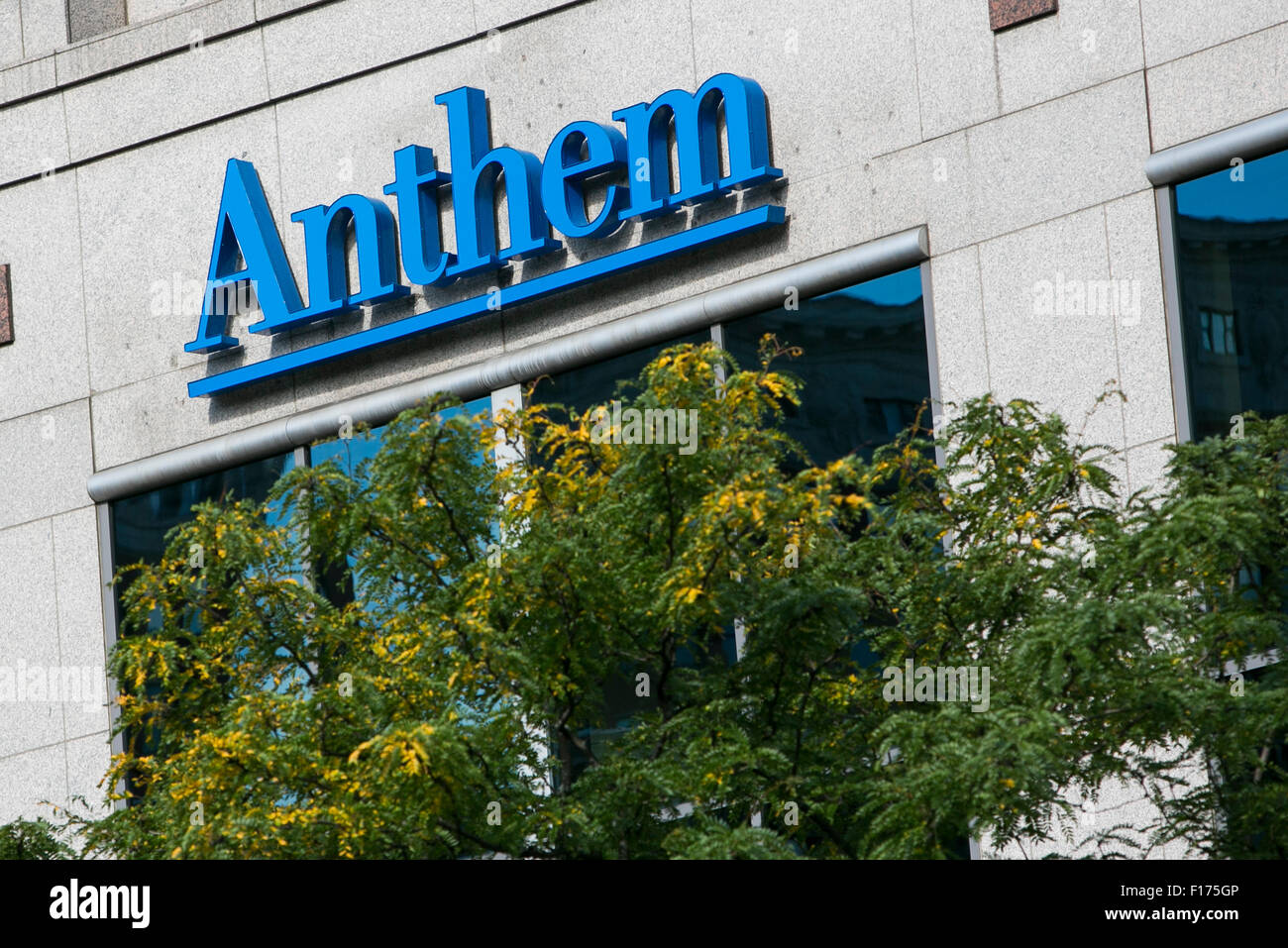 A logo sign outside of the headquarters of Anthem Inc., in Indianapolis, Indiana on August 15, 2015. Stock Photo