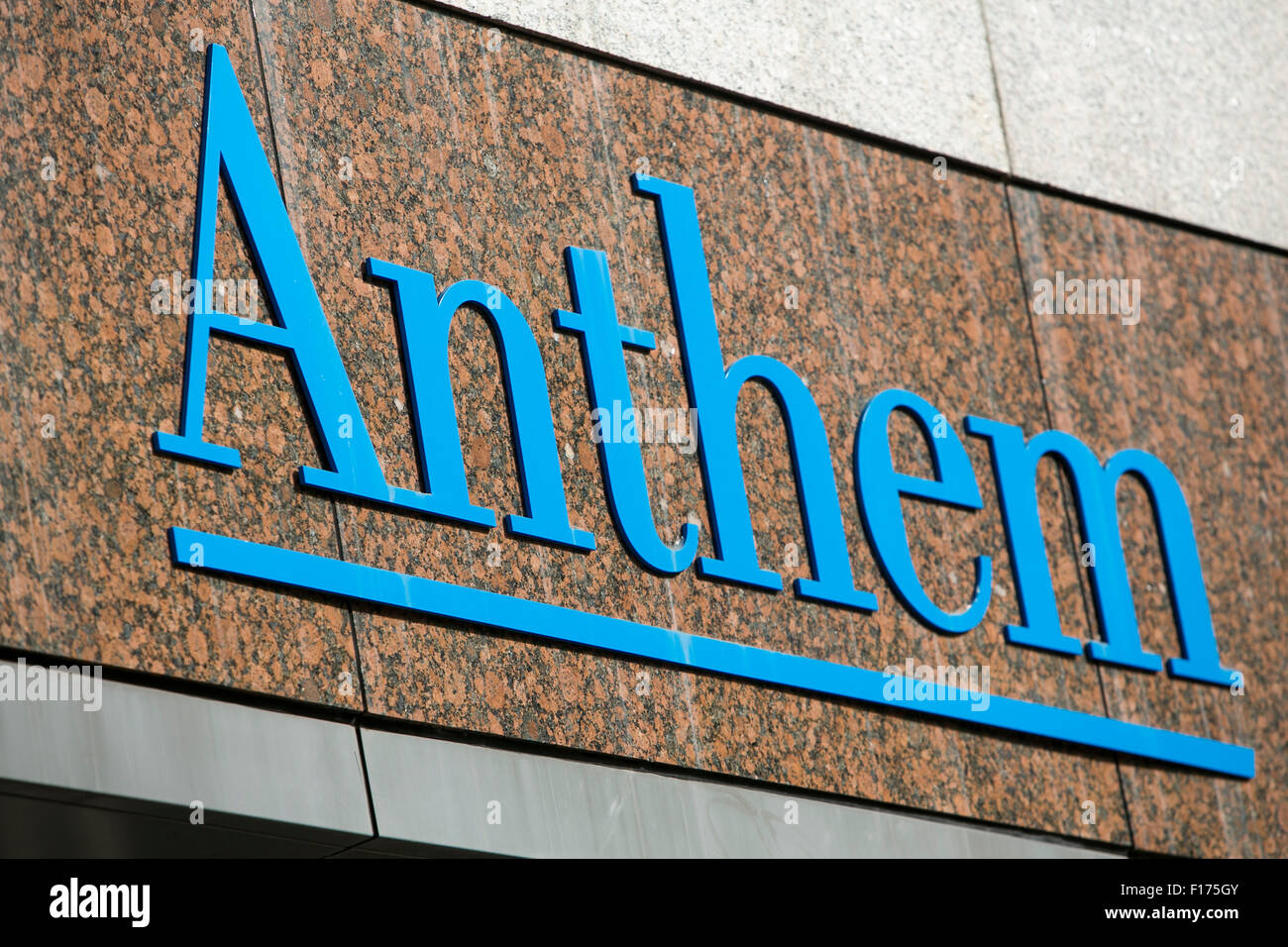 A logo sign outside of the headquarters of Anthem Inc., in Indianapolis, Indiana on August 15, 2015. Stock Photo