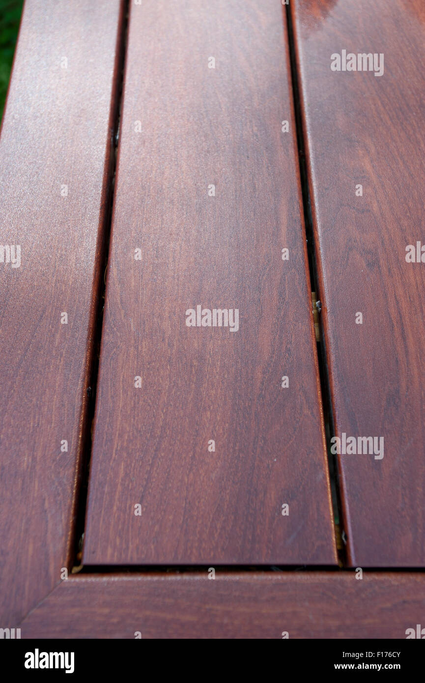 Synthetic wood decking on a backyard patio deck The fake wood is made