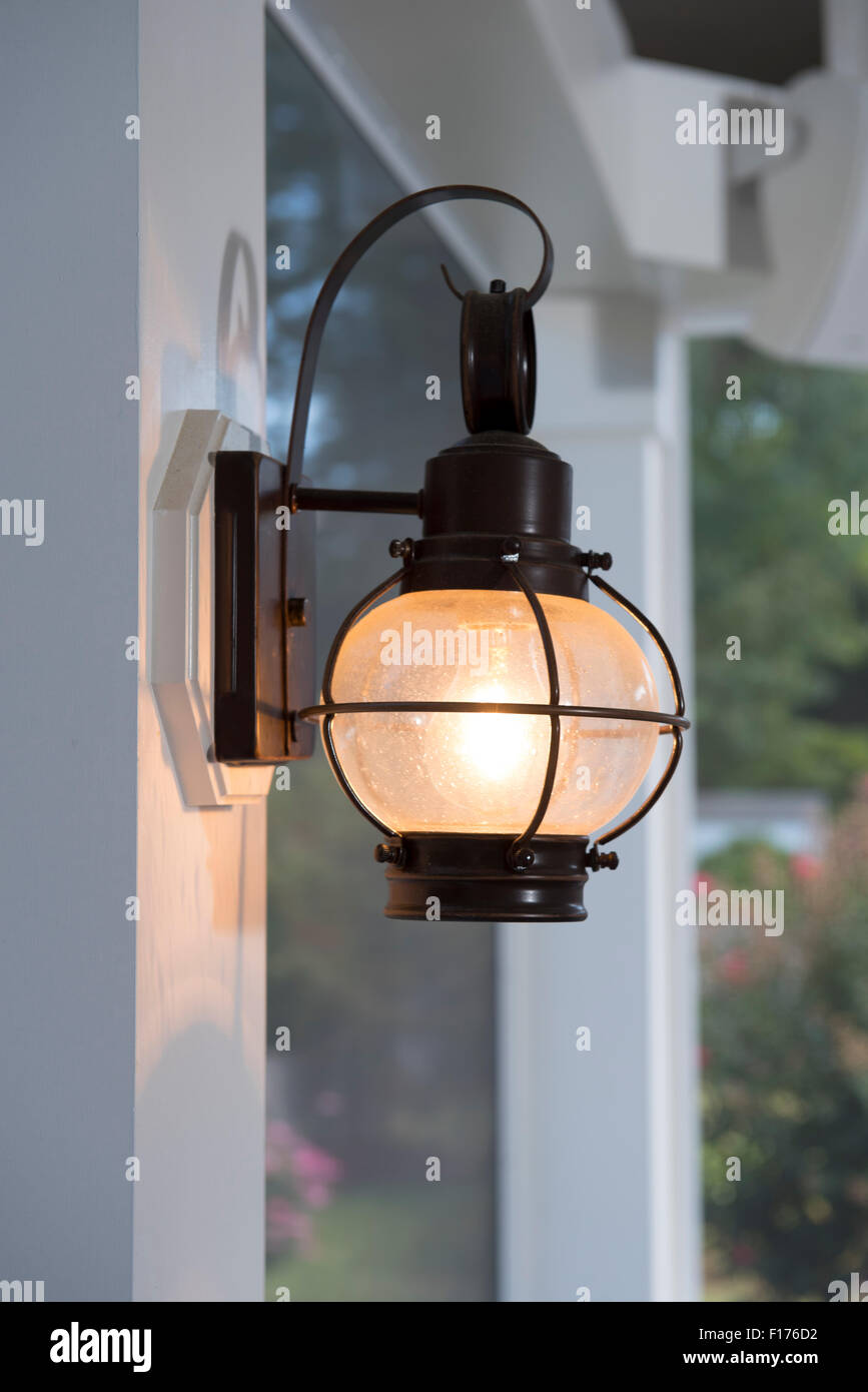 low energy use lighting on screened in porch in Maryland USA Stock Photo