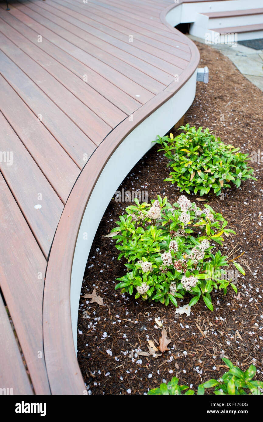 Synthetic wood decking on a backyard patio deck The fake wood is made
