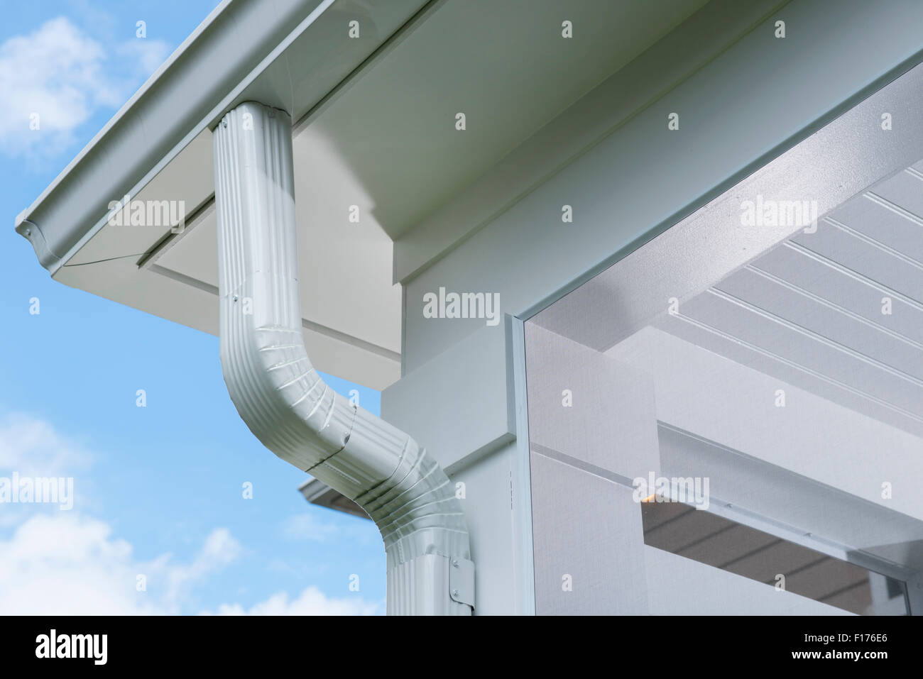 Home rain water drainage downspout gutters on the exterior of a Stock ...