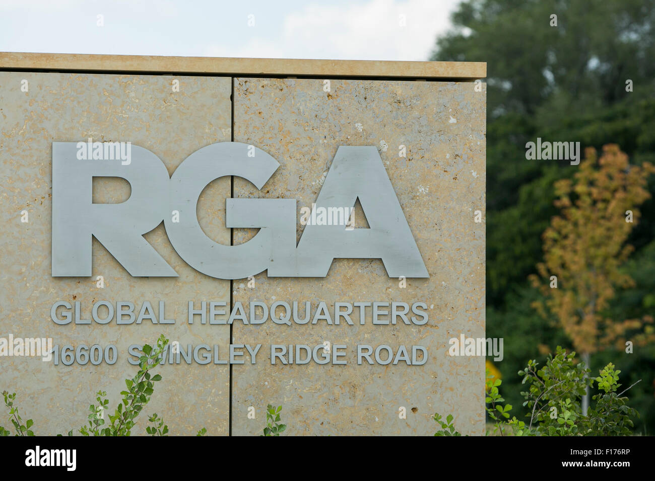 A logo sign outside of the headquarters of Reinsurance Group of America ...