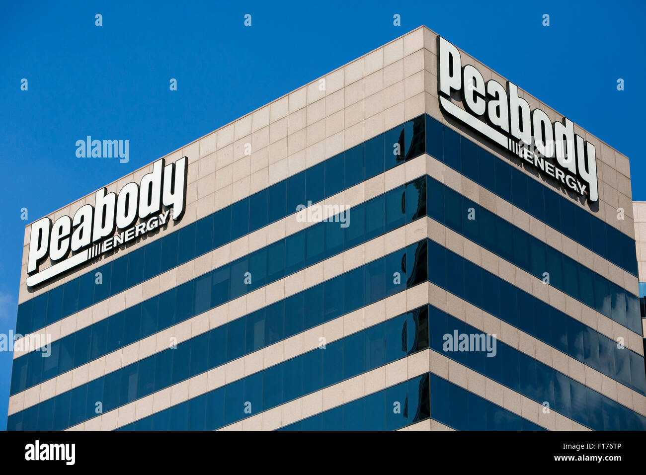 A logo sign outside of the headquarters of the Peabody Energy