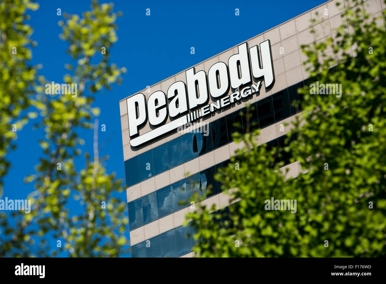 A logo sign outside of the headquarters of the Peabody Energy