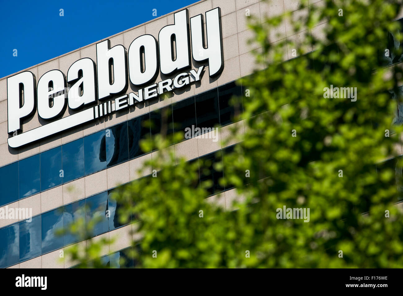 A logo sign outside of the headquarters of the Peabody Energy