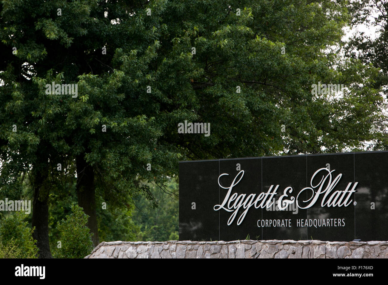A logo sign outside of the headquarters of Leggett & Platt (L&P) in