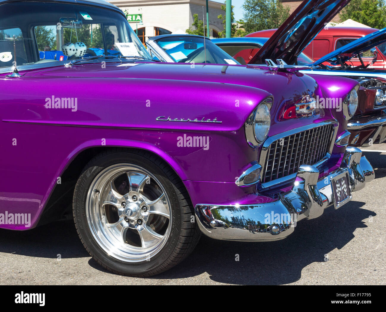Front view of a purple 1955 Chevrolet at a classic car show, Gig Harbor