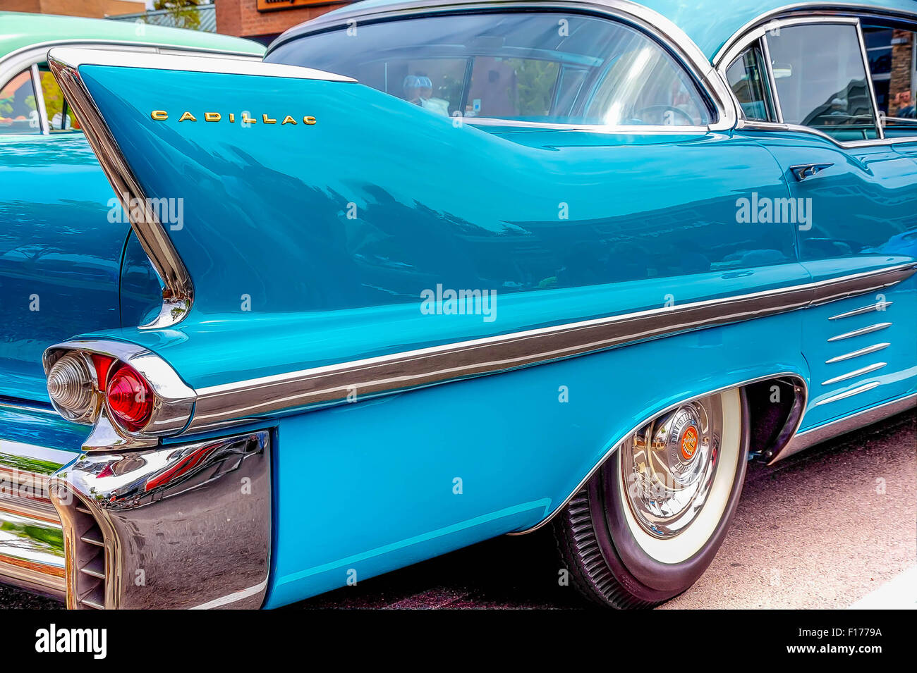 Close up of the tail fin of a 1950’s Cadillac at a classic car show
