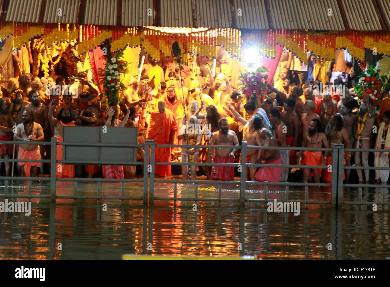 India. 29th Aug, 2015. Naga sadhu or holy man arrive to take a holy
