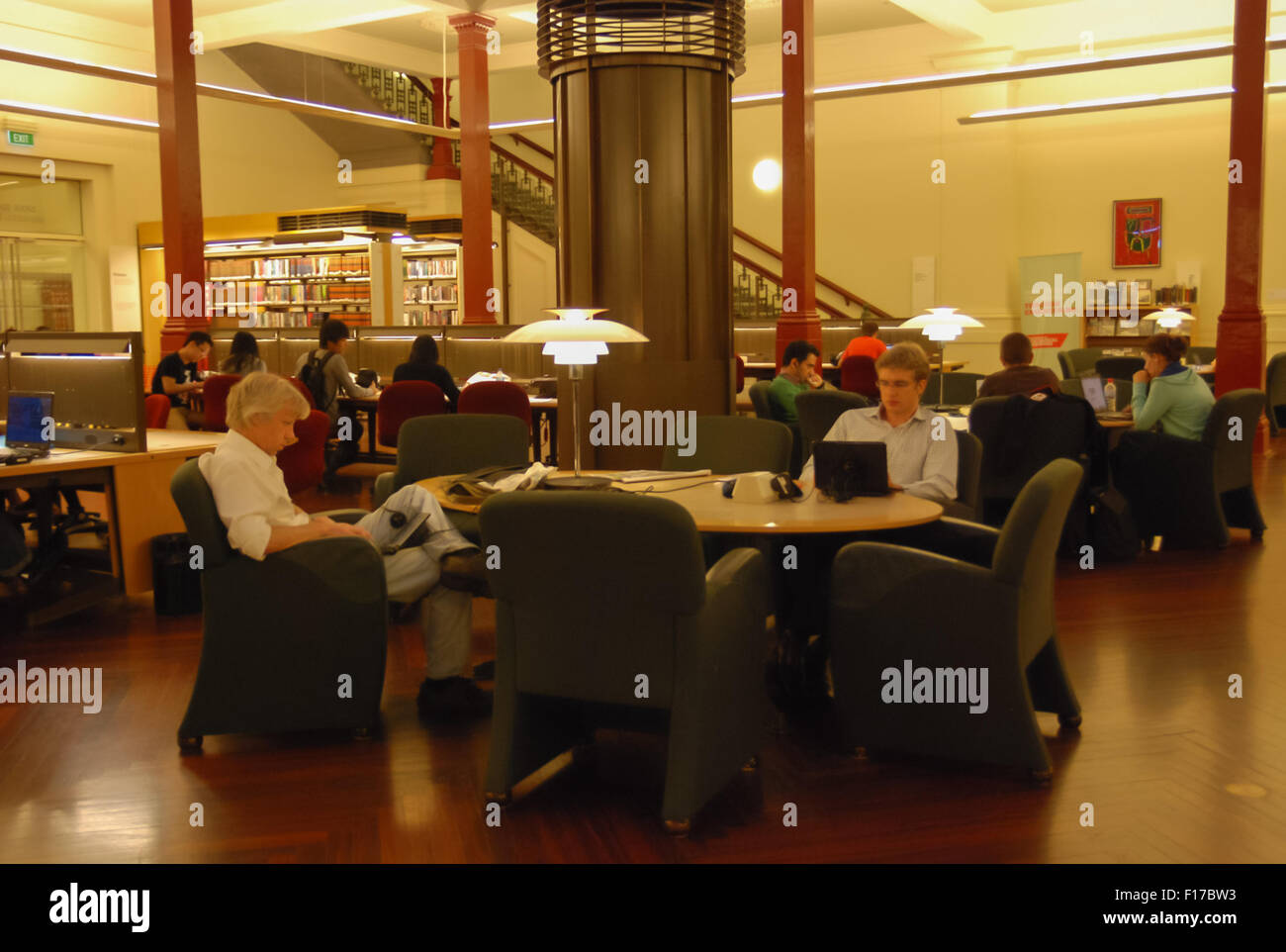 People using laptop and reading at the reading room of State Library of Victoria, Melbourne