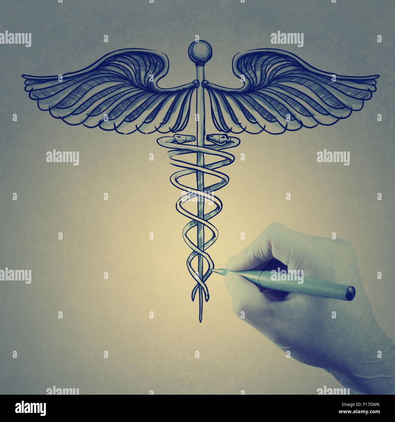 doctor hand draws Caduceus as vintage style concept Stock Photo
