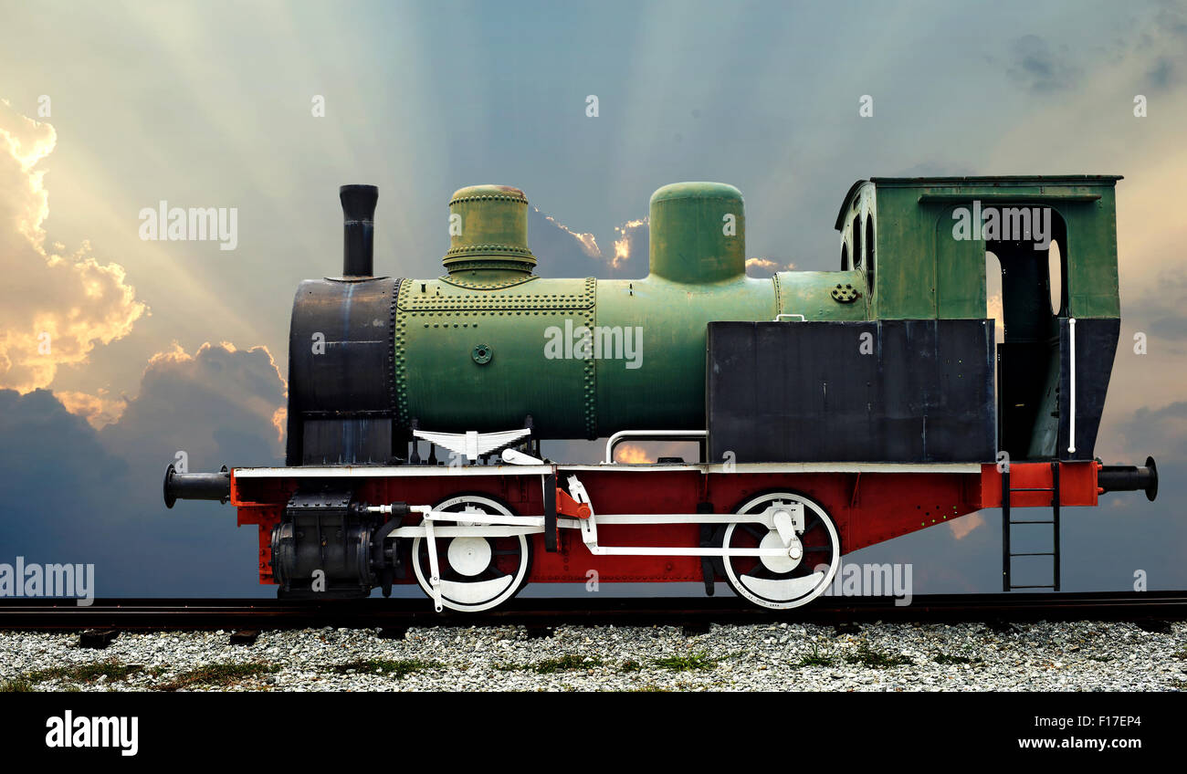 old steam engine locomotive train with beautiful sunbeam background Stock Photo