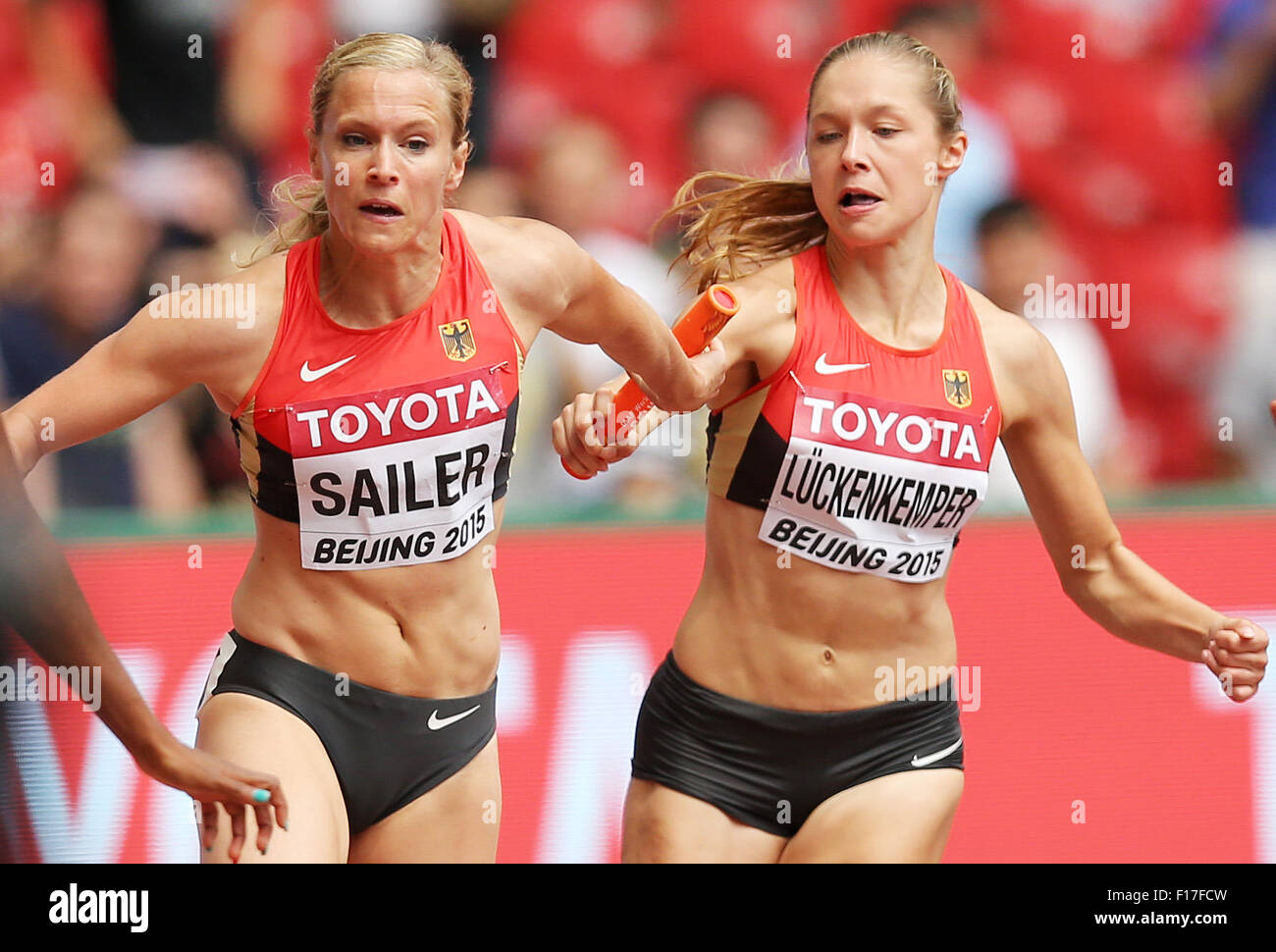 Beijing, China. 29th Aug, 2015. Germany's Verena Sailer and Gina Lückenkemper in action in the women's 4x100 M Relay Qualification at the 15th International Association of Athletics Federations (IAAF) Athletics World Championships at the National stadium, known as Bird's Nest, in Beijing, China, 29 August 2015. Photo: Christian Charisius/dpa/Alamy Live News Stock Photo
