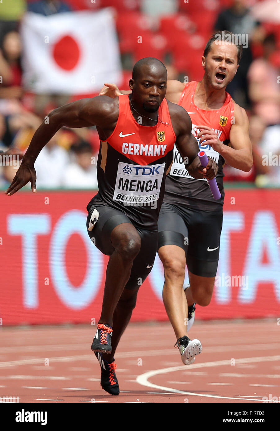 Beijing, China. 29th Aug, 2015. Germany's Aleixo-Platini Menga and Alexander Kosenkow (r) in action in the men's 4x100 M Relay Qualification at the 15th International Association of Athletics Federations (IAAF) Athletics World Championships at the National stadium, known as Bird's Nest, in Beijing, China, 29 August 2015. Photo: Christian Charisius/dpa/Alamy Live News Stock Photo