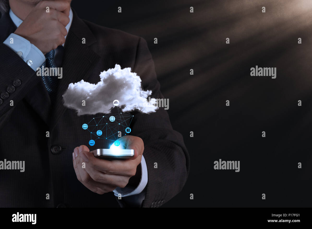 Businessman hand working with a Cloud Computing diagram on the new ...