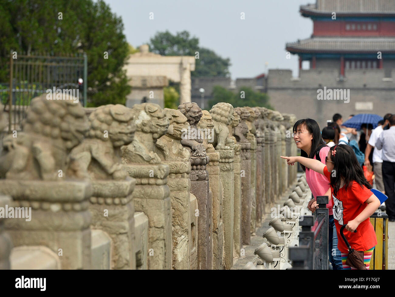 Beijing, Capital of China. 29th Aug, 2015. People visit Lugou Bridge where Japan launched the all-out war of aggression against China, in Beijing, Capital of China, Aug. 29, 2015. China will stage a military parade on Sept. 3 to commemorate the 70th anniversary of the victory of the Chinese People's War of Resistance Against Japanese Aggression and the World Anti-Fascist War. © Peng Zhaozhi/Xinhua/Alamy Live News Stock Photo