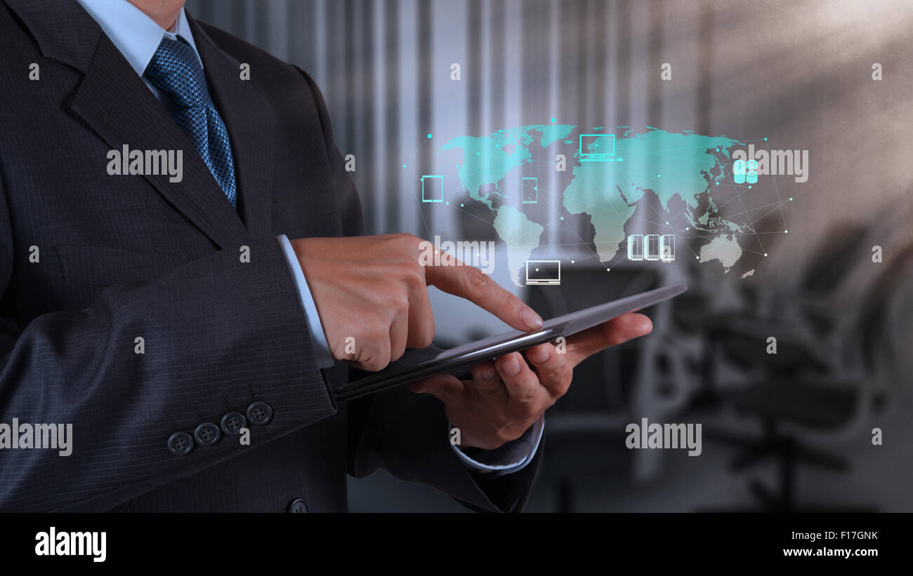 businessman hand using tablet computer and board room background Stock ...