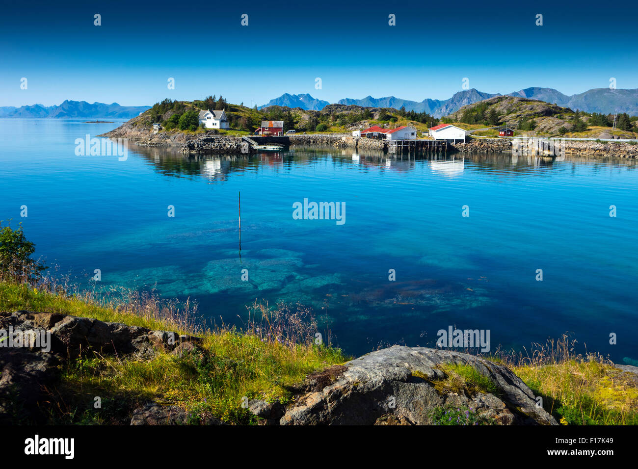 Henningsvaer village and blue sea Lofoten Islands Norway Stock Photo