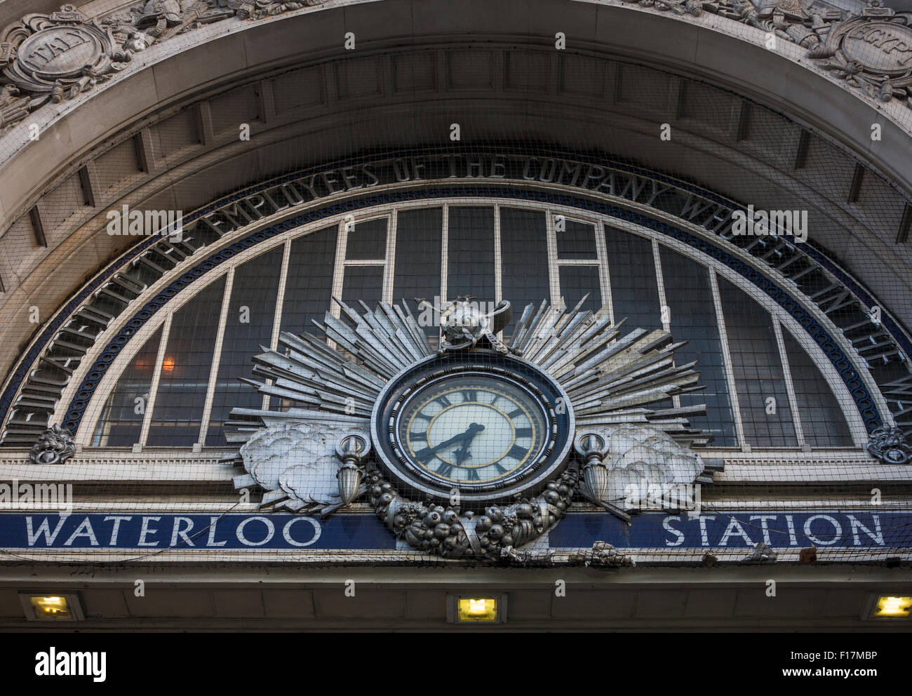 The clock above the steps of waterloo station Stock Photo