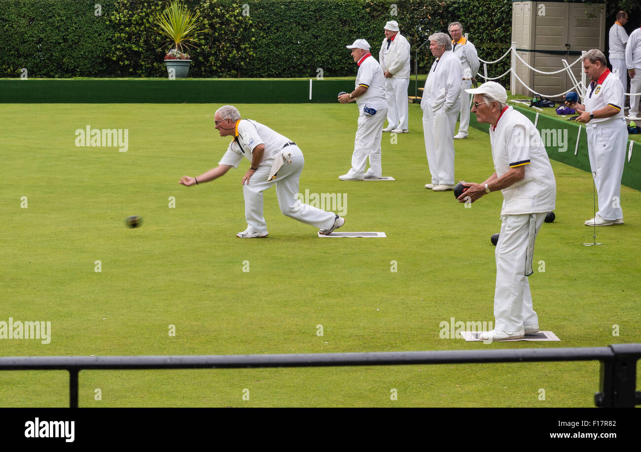 Players on a bowling green competing in a match at the Argyll Bowling Club, Westbourne, Bournemouth, Dorset, England, UK. Stock Photo