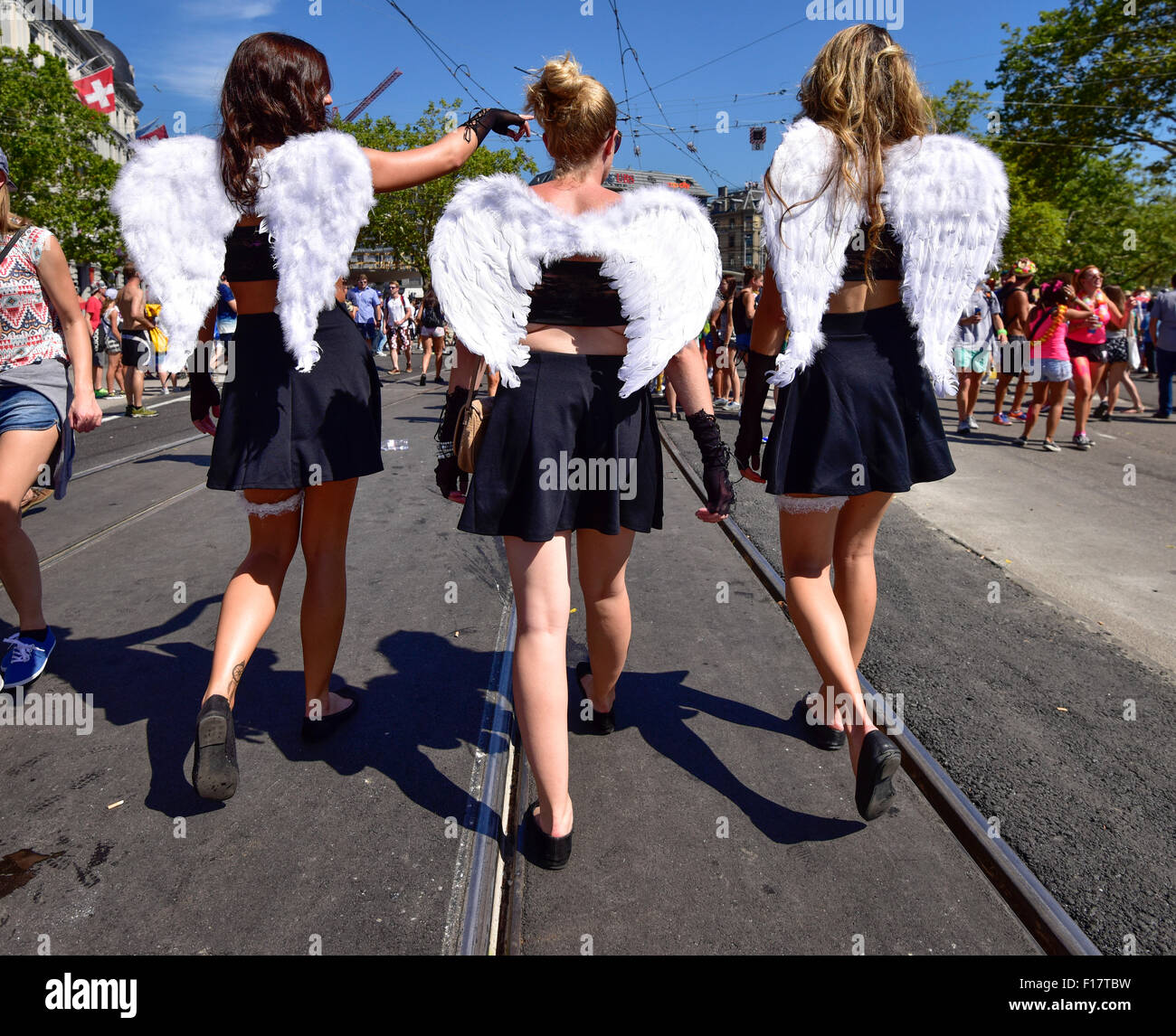 Zurich, Switzerland. 29th Aug, 2015. Patrol of angels: party people in fancy outfits at Zurich Streetparade, one of the world's largest techno music event. Credit:  Erik Tham/Alamy Live News Stock Photo