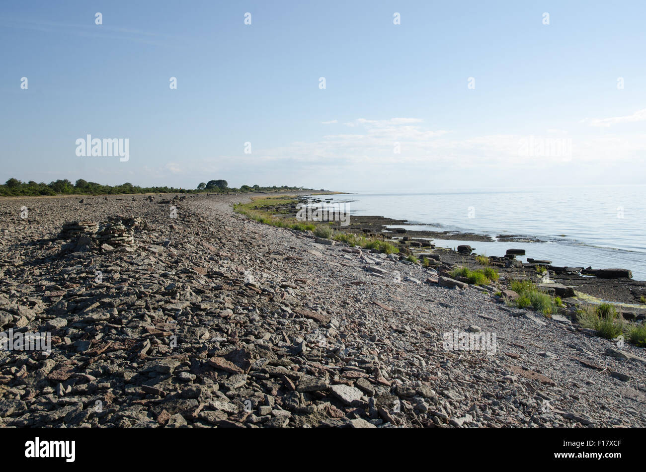 View at a coast with stones and pebbles at the island oland in Sweden Stock Photo