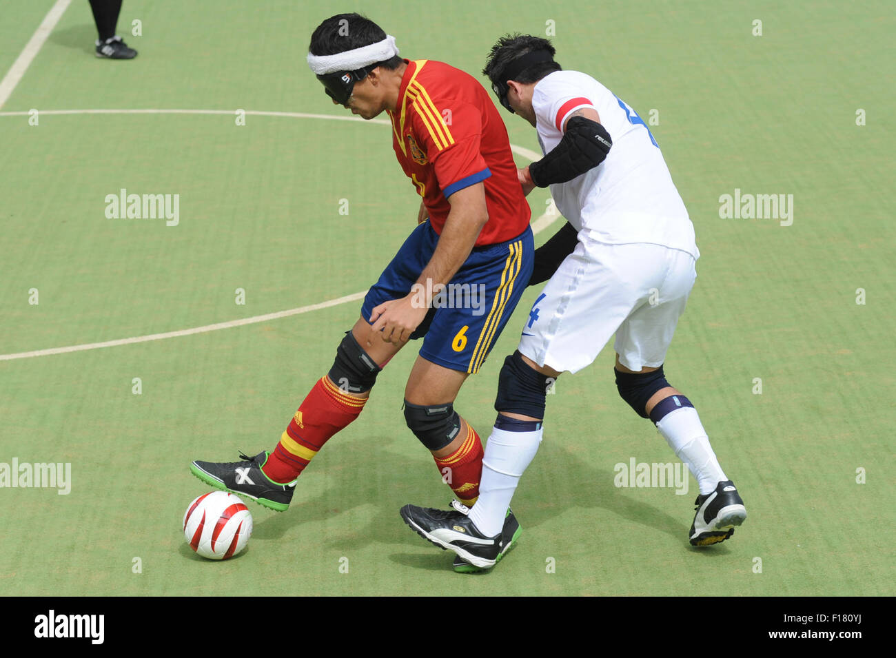 Hereford, UK. 29th Aug, 2015. IBSA Blind Football European Championships 2015 - 3rd/4th place play-off - England v Spain. Point 4, Royal National College for the Blind, Hereford. Spain Captain Adolfo Costa & England Captain Keryn Seal. Credit:  James Maggs/Alamy Live News Stock Photo