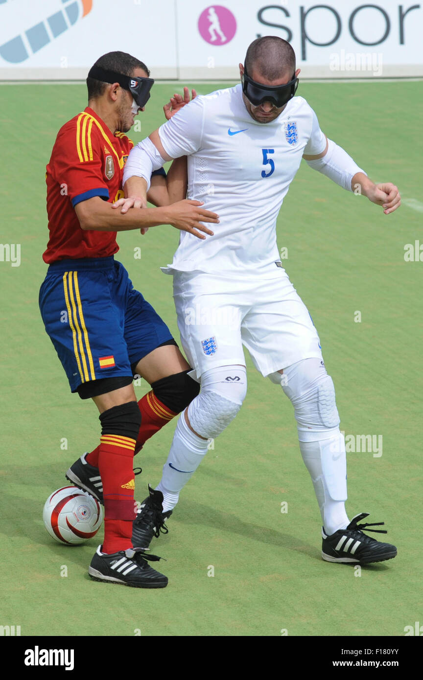 Hereford, UK. 29th Aug, 2015. IBSA Blind Football European Championships 2015 - 3rd/4th place play-off - England v Spain. Point 4, Royal National College for the Blind, Hereford. Spain's Youssef El Hadaoui & England's Dan English. Credit:  James Maggs/Alamy Live News Stock Photo