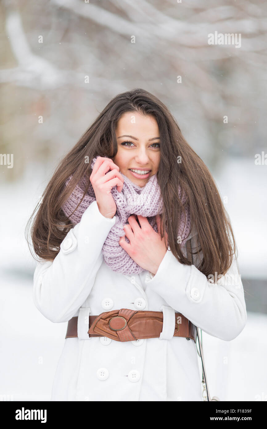 Young woman in park at winter Stock Photo - Alamy