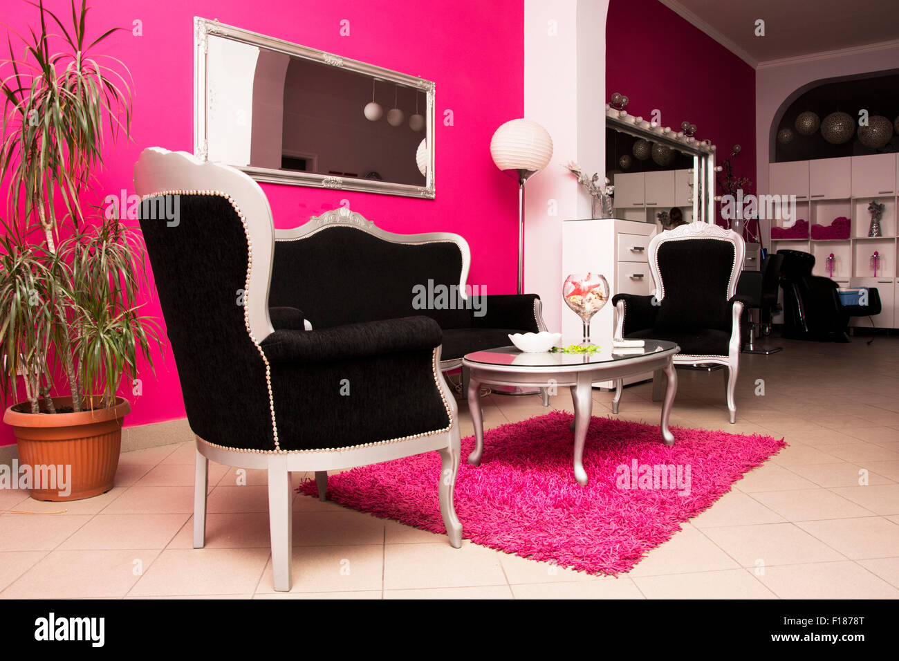 Beauty salon beautiful decorated and created to be colorful,cheerful,women only. Colors are black and pink. Stock Photo