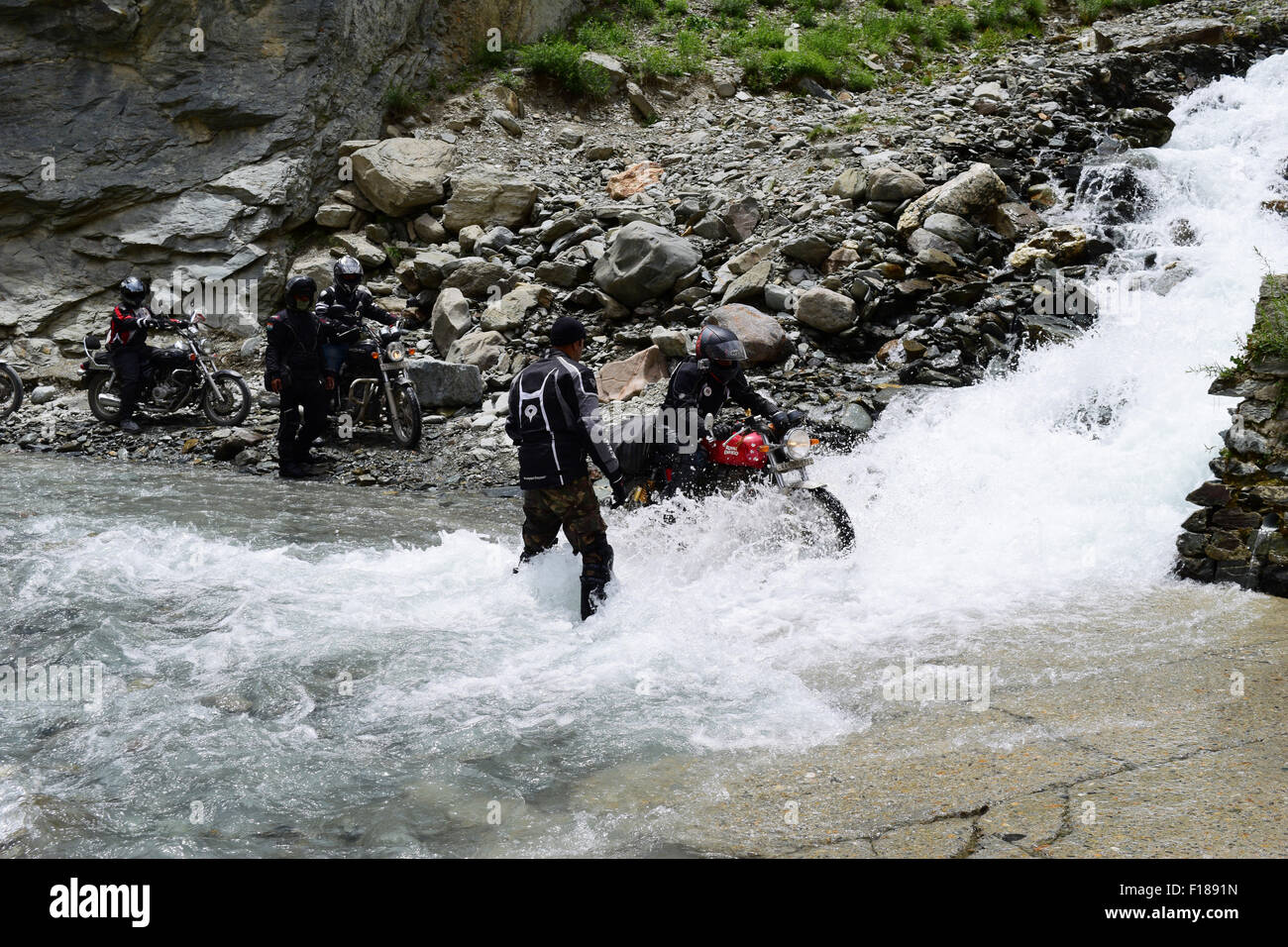 Adventure Bike riders Biking Trip on dangerous Ladakh India Road cross