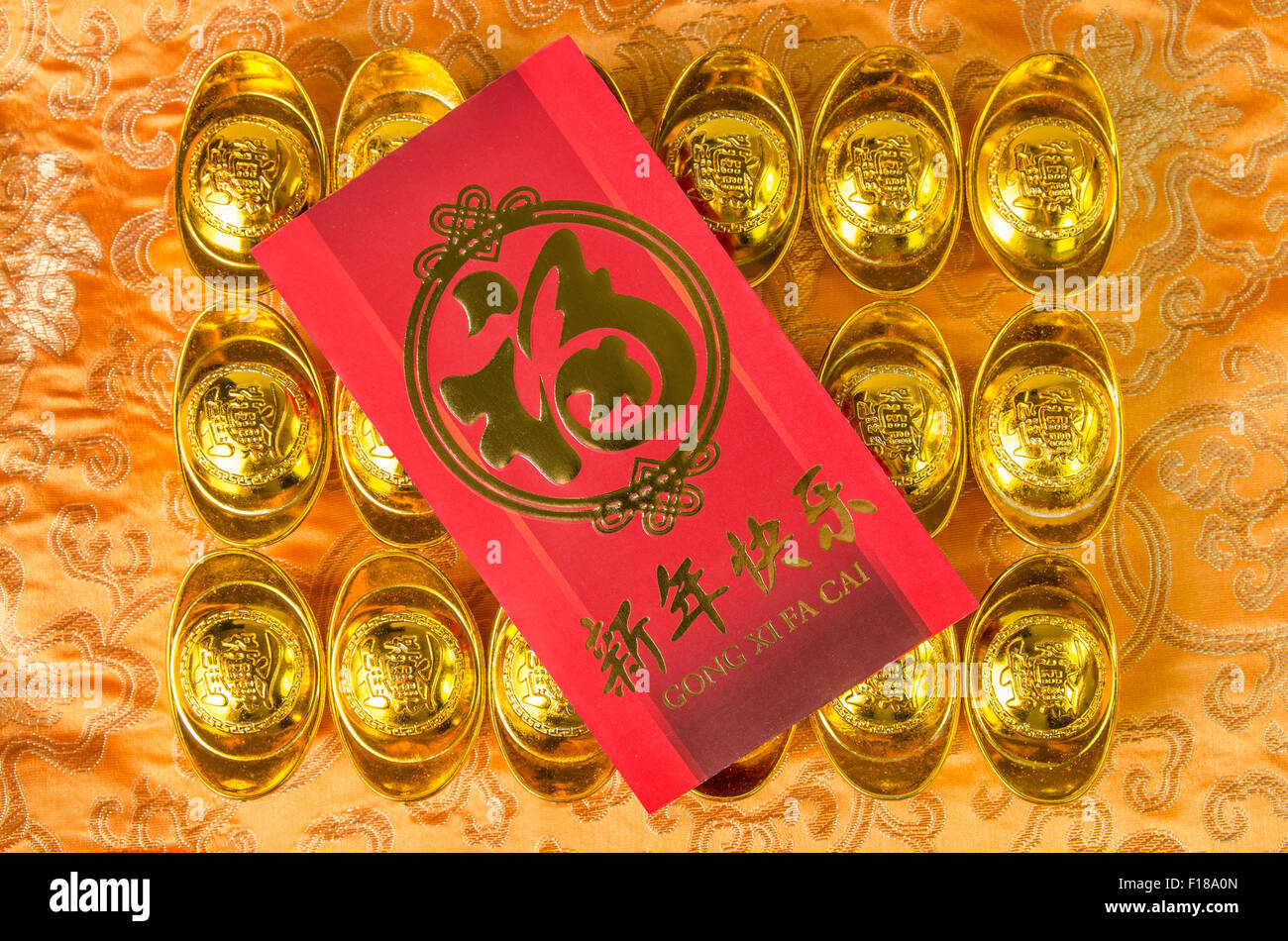 Chinese gold ingots (Foreign text means blessing) decoration Stock Photo