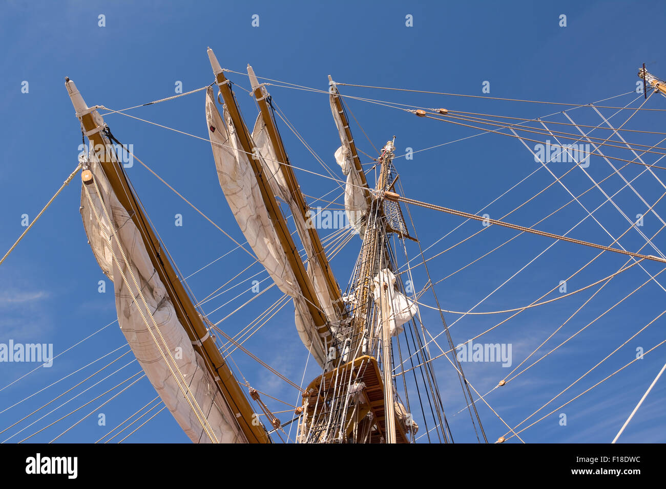 Mast of sail ship in blue sky Stock Photo