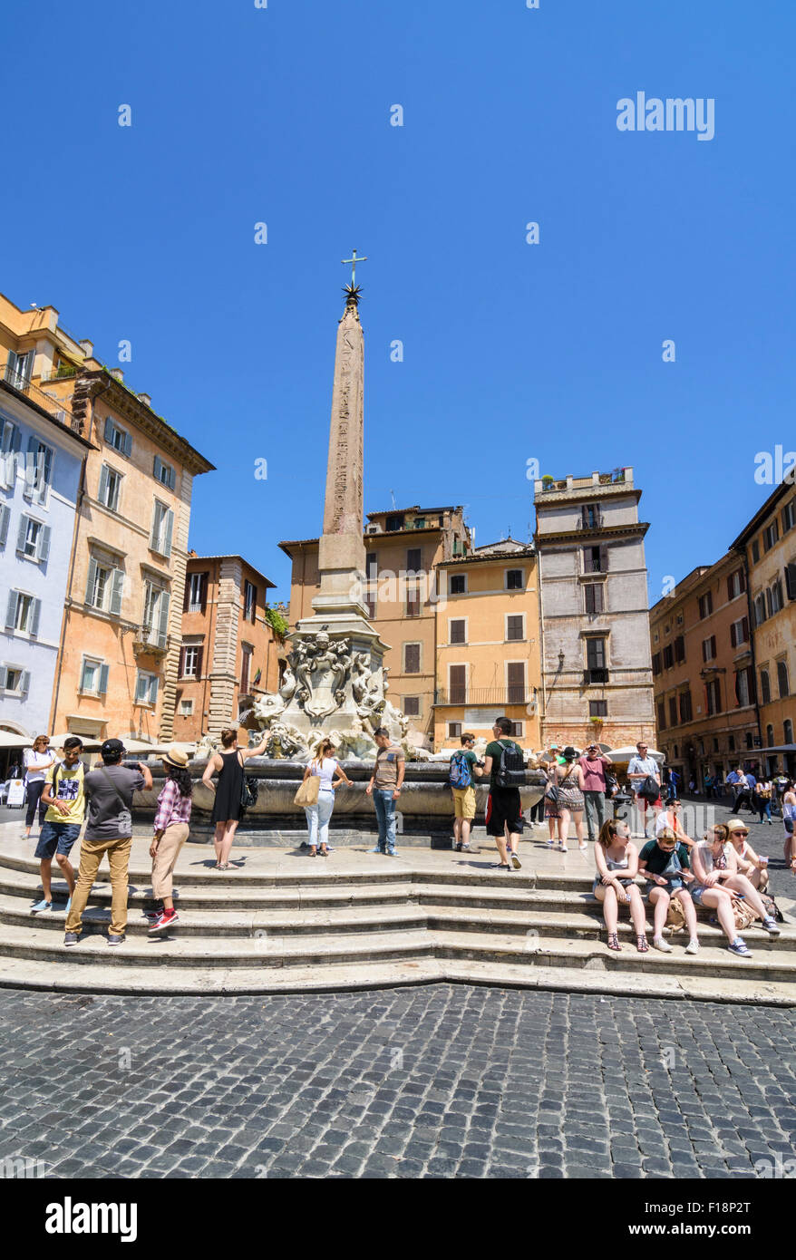 Tourists at the Fontana del Pantheon in Piazza della Rotonda, Rome, Italy Stock Photo