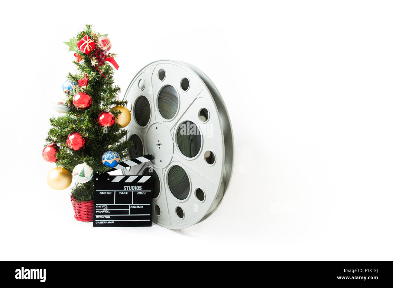 Christmas tree with big movie reel and clapperboard Stock Photo