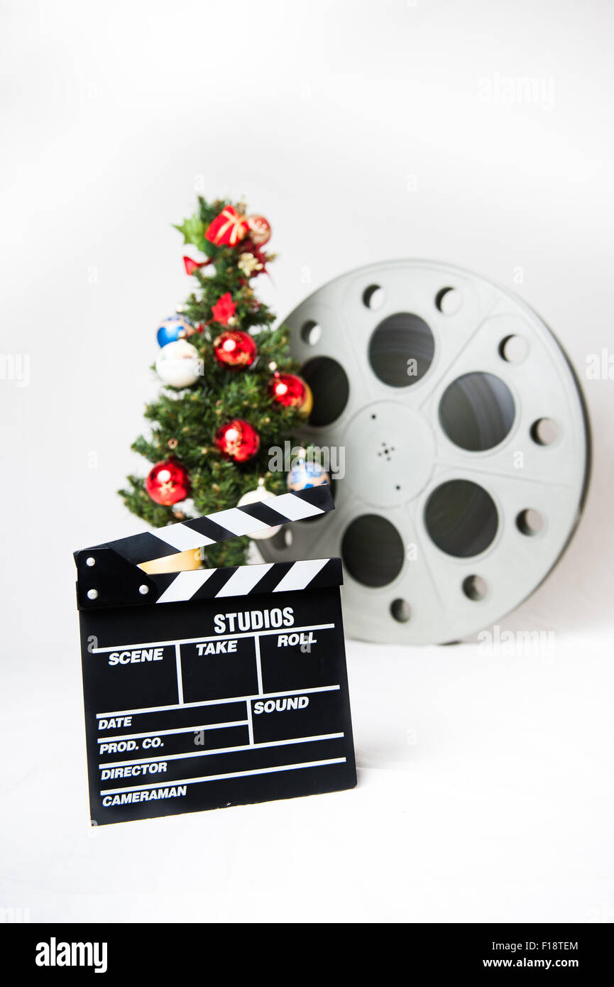 Movie clapper board with christmas tree and reel Stock Photo