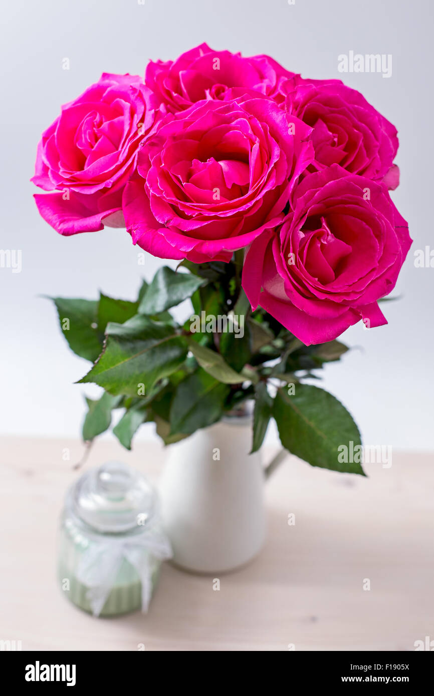 Bouquet of beautiful pink roses on white background Stock Photo - Alamy