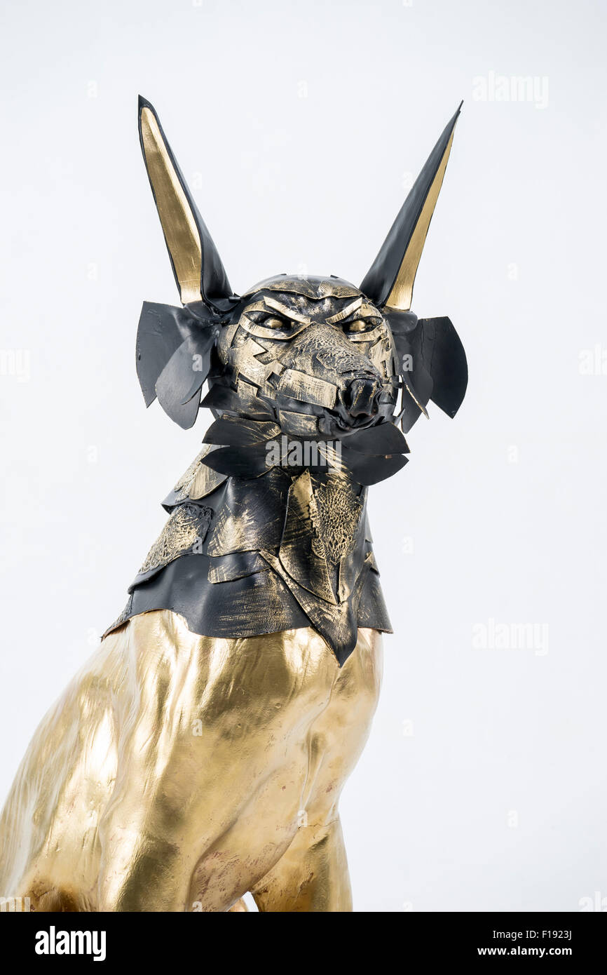 Temple, sculpture of the Egyptian god Anubis, gold figure and black jackal  Stock Photo - Alamy