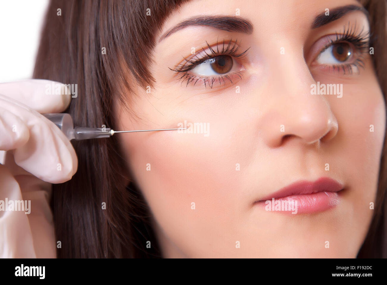 Cosmetic injection, beautiful woman close-up studio portrait Stock Photo