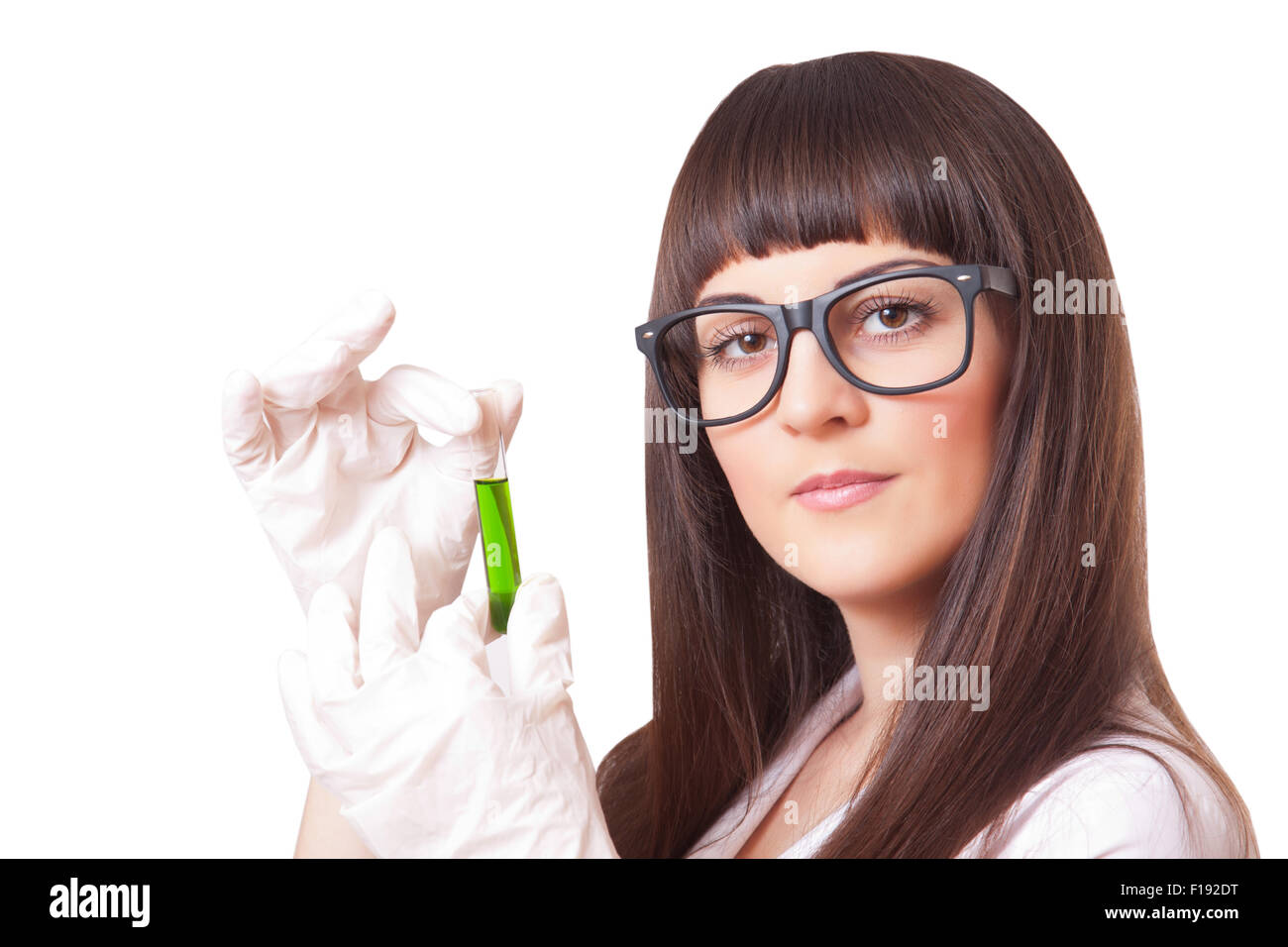 Female lab worker holding test-tube, isolated on white background Stock Photo