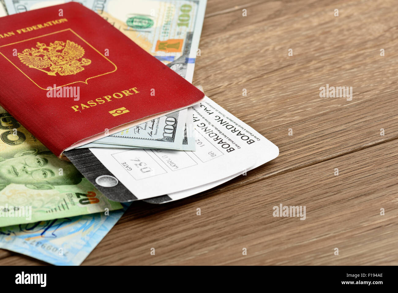 Airline tickets and documents on wooden table Stock Photo