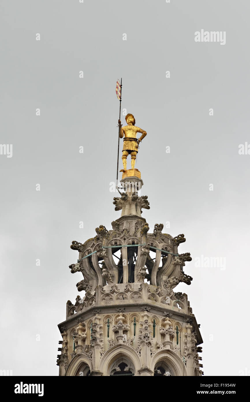 Statue decorating top of the tower of medieval city hall in Oudenaarde, Belgium Stock Photo