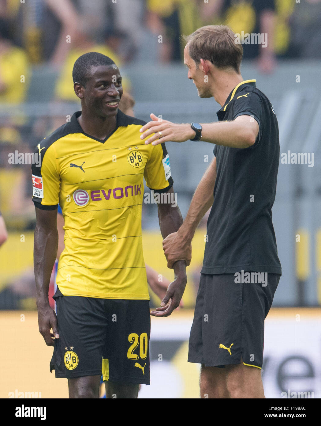 Dortmund's Adrian Ramos (l) and coach Thomas Tuchel talk after the German  Bundesliga football match between Borussia Dortmund and Hertha BSC at the  Signal Iduna Park in Dortmund, Germany, 30 August 2015.