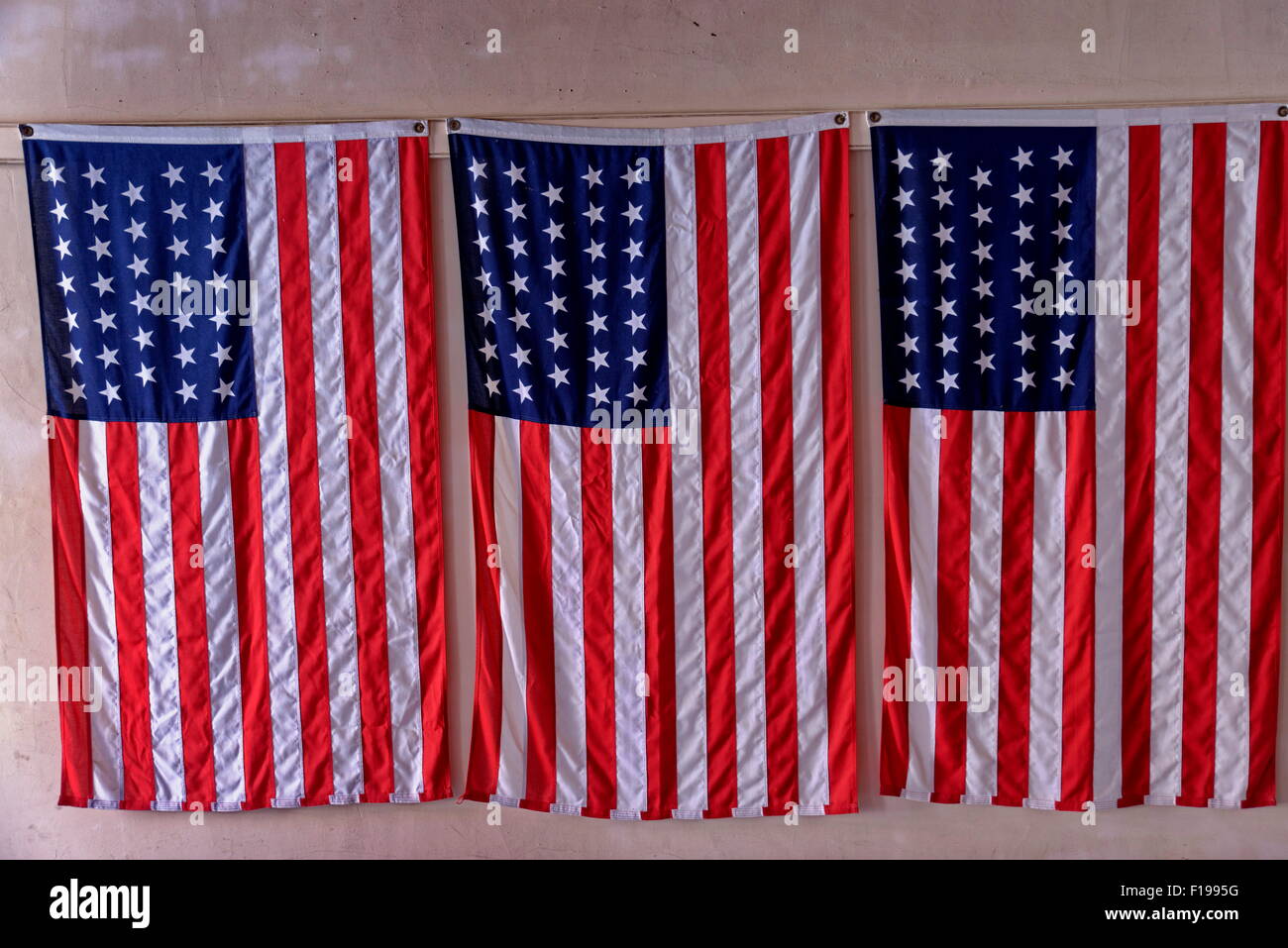 Three U.S. Civil War era flags with 34 stars on display at Fort